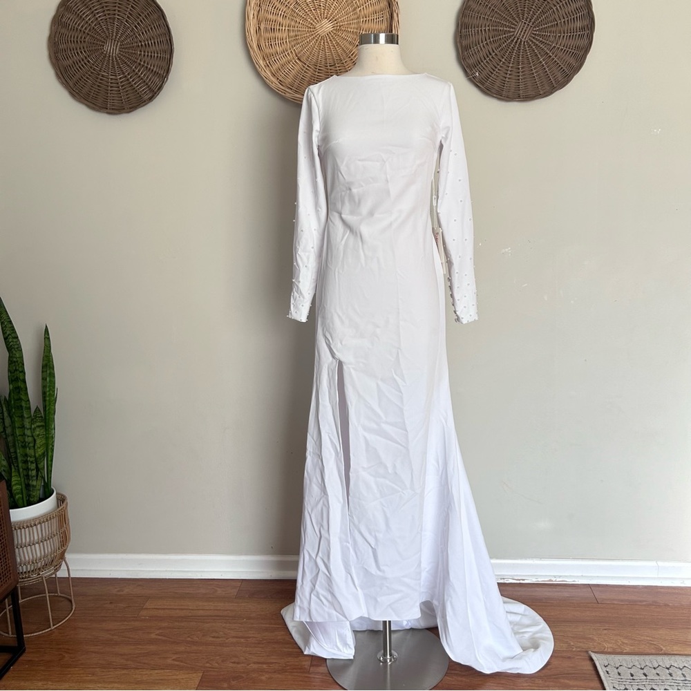 Mingda’s wedding gown new with tag bra friendly